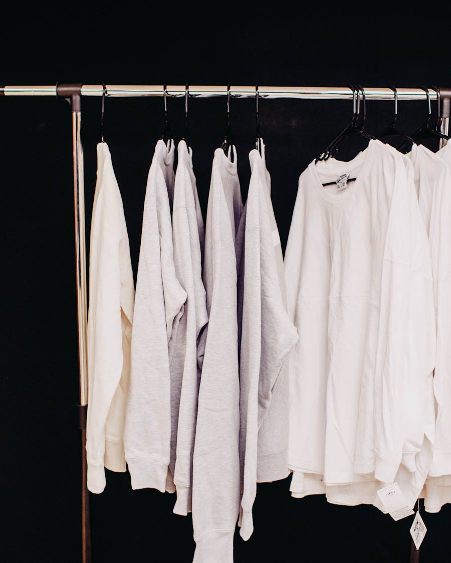Freshly dry-cleaned garments hanging ready for collection